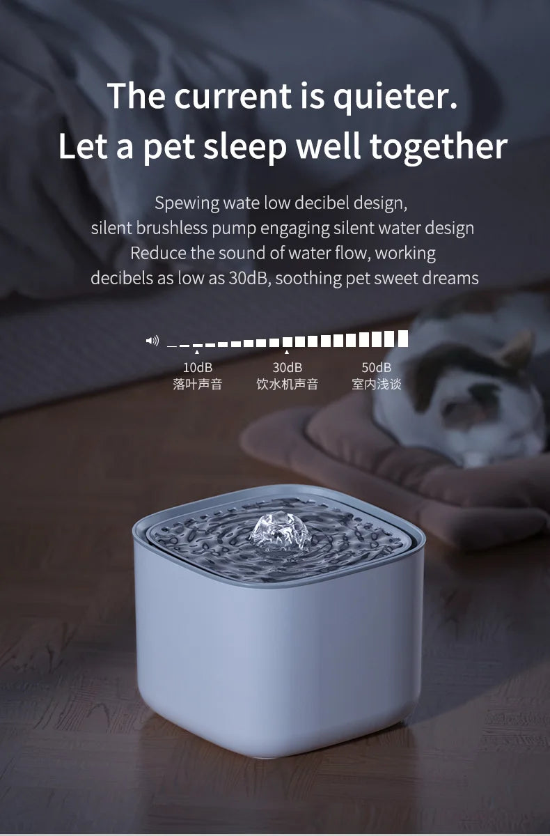 Square white quiet pet water fountain with a bubbling central stream and a cat sleeping in the blurred background.