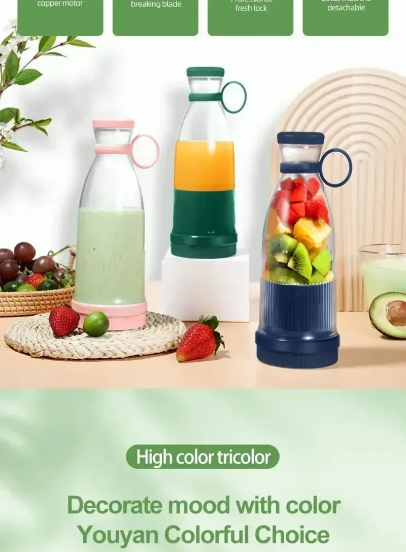 Three portable, cylindrical electric blenders in pink, green, and dark blue, filled with smoothie ingredients.