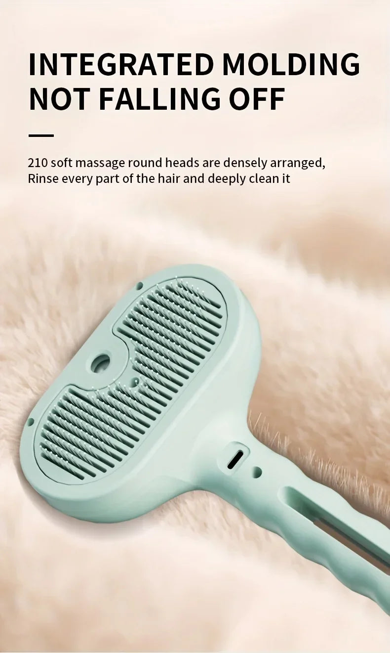 Sage green handheld pet massage brush with dense, soft rubber bristles on a textured background.