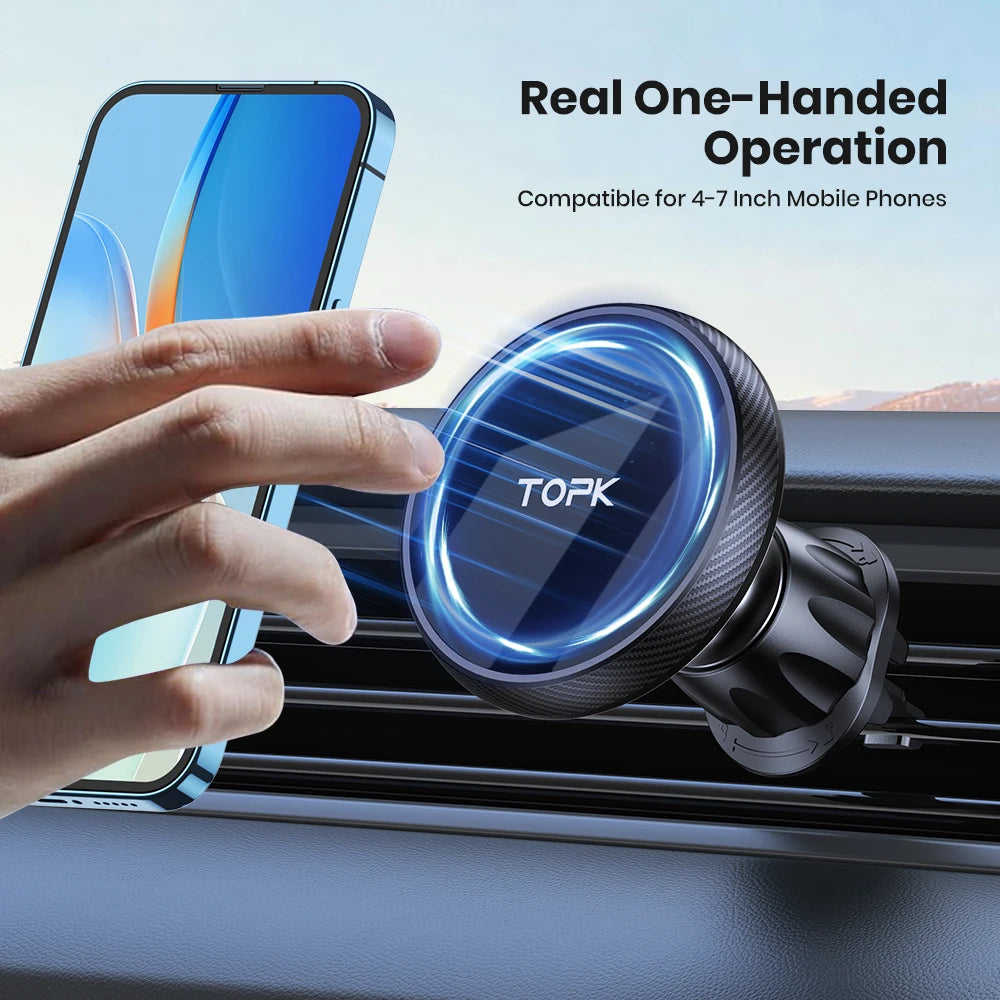 Black circular magnetic car phone mount attaches to air vent. Hand placing a smartphone near the glowing blue center.