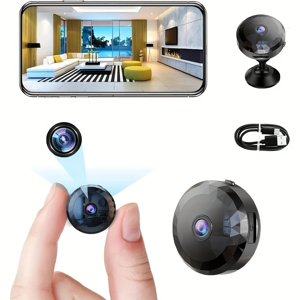Small black plastic wireless security camera with a lens, mount, and USB charging cable.