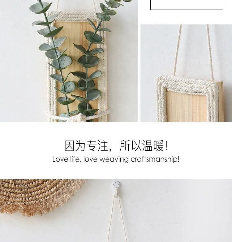 Bohemian wall decor featuring a light wood panel, white rope border, and a hanging faux eucalyptus stem.