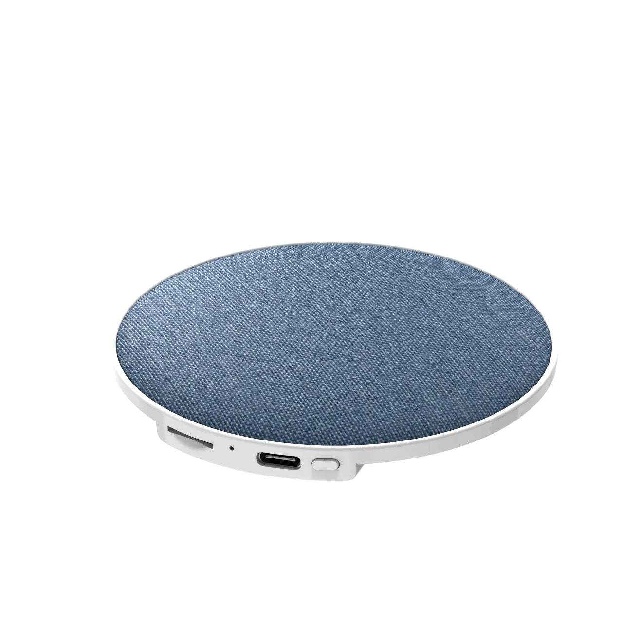 A circular, blue fabric-covered wireless pillow speaker with a white base and visible charging port.