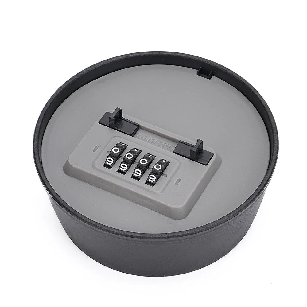Black and grey plastic circular combination lock box with four numbered rotating dials.