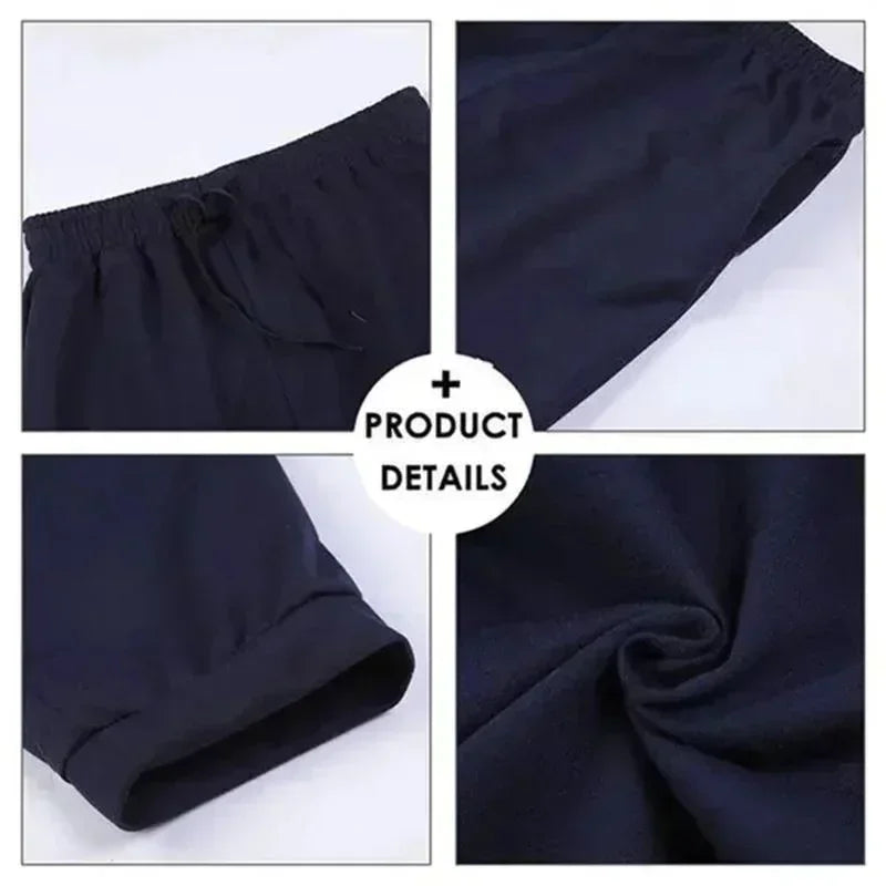 Navy blue lounge shorts featuring an elasticated drawstring waistband, side pockets, and cuffed hems.
