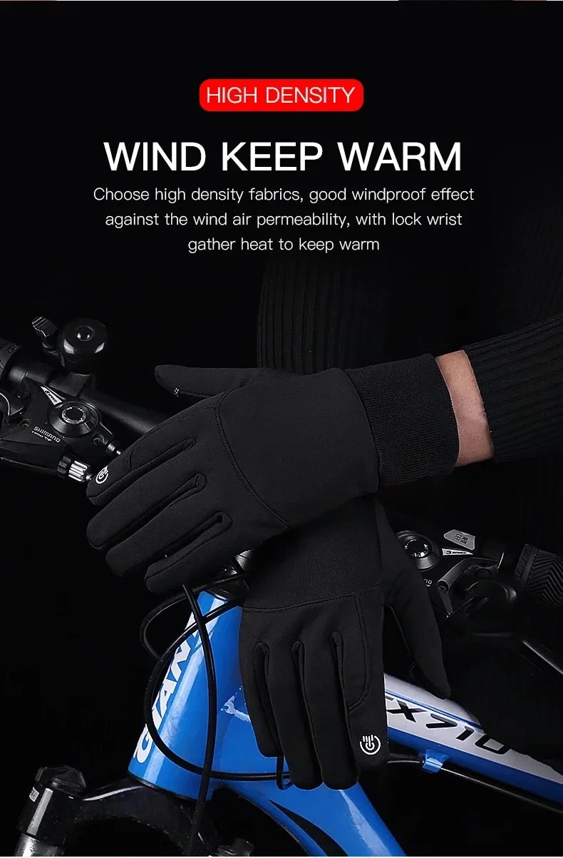 Person wearing black windproof cycling gloves with elasticated cuffs, resting hands on bicycle handlebars.