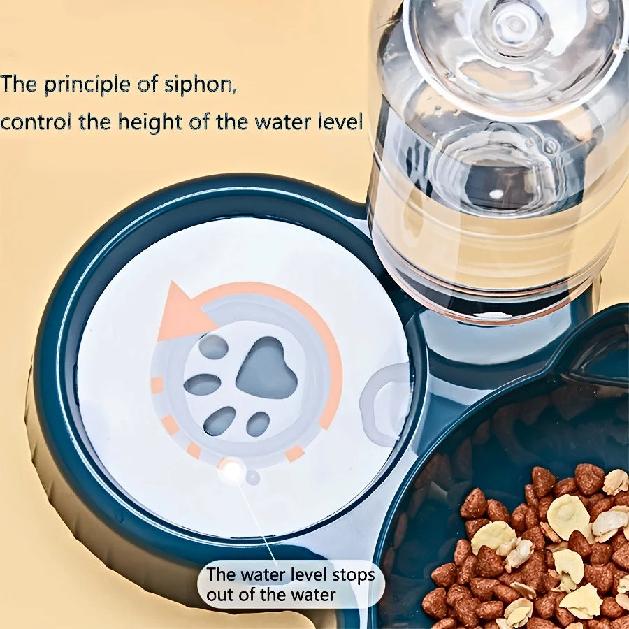 Dark teal 3-in-1 pet feeding station with a gravity water dispenser and a separate food bowl for dry kibble.