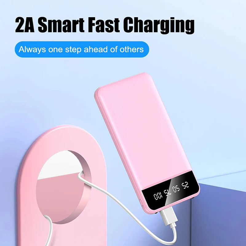 Slim, pink 50,000mAh portable power bank with a black LED digital battery display and fast charging cable.