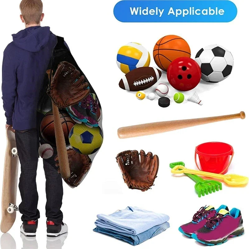 A black mesh drawstring storage bag filled with various sports equipment, balls, a wooden bat, and trainers.