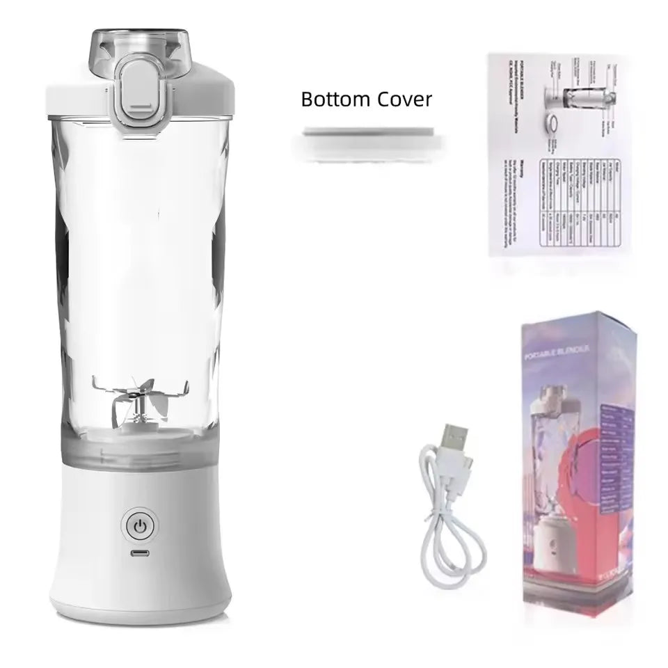White portable electric blender with clear container, USB cable, instructions, and product box.