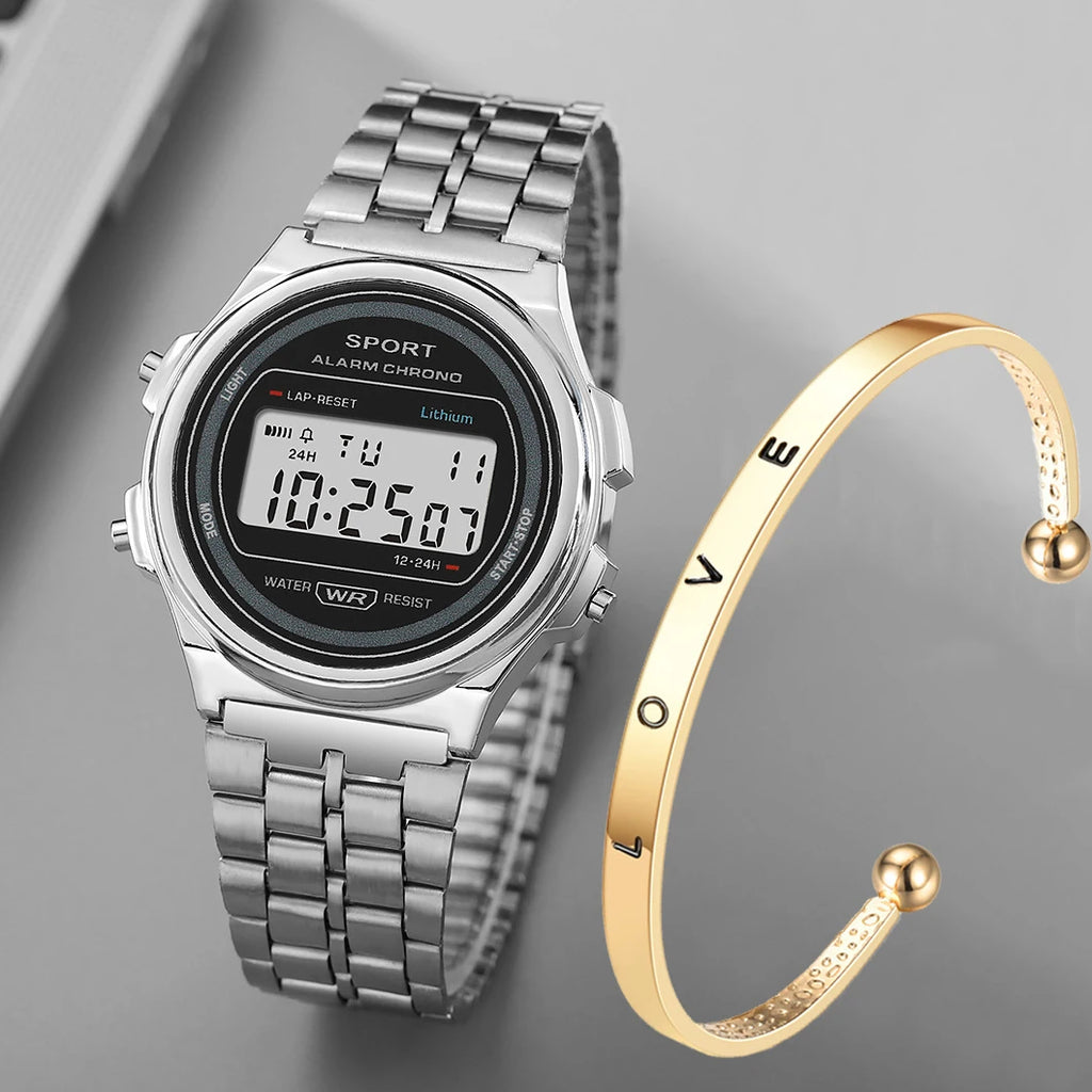Silver retro-style digital watch with metal strap paired with a gold-tone 'LOVE' cuff bracelet.