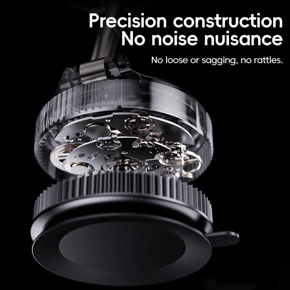 Close-up of a black, circular precision gear mechanism with internal metallic components against a black background.