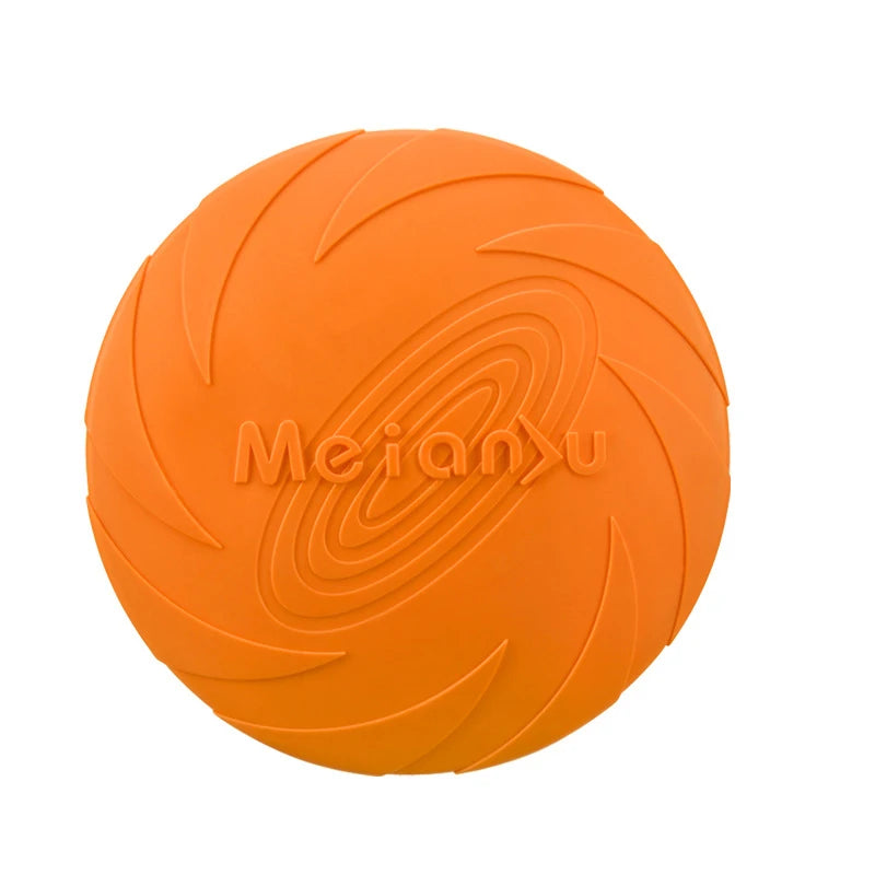 Bright orange silicone flying disc dog toy with a durable, textured spiral surface design.