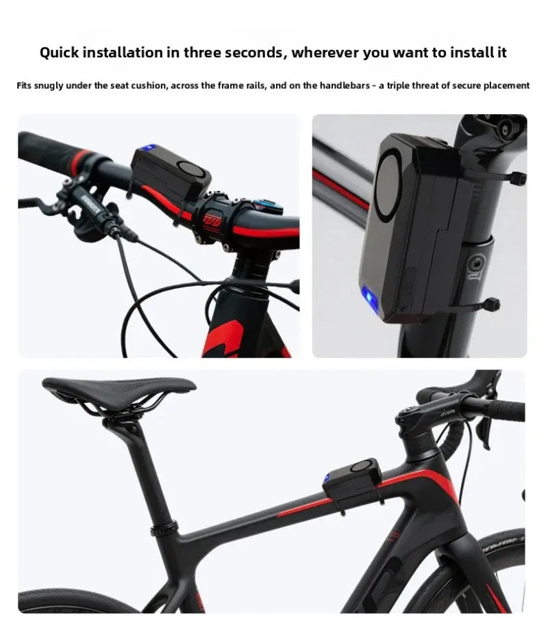 Black plastic bicycle alarm mounted on bike handlebars, seat post, and frame with zip ties.