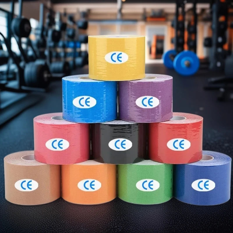 A pyramid stack of multi-coloured kinesiology sports tape rolls, each featuring a white CE certification label.