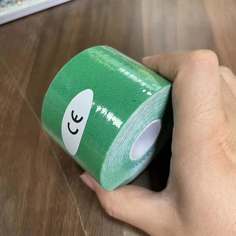 A roll of bright green kinesiology sports tape held in a hand, featuring a white CE certification label.