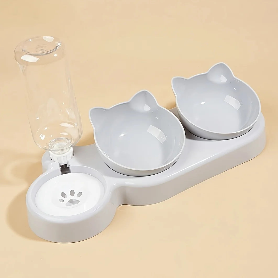 Light grey 3-in-1 pet feeding station with two cat-shaped bowls and a gravity water dispenser with a paw print detail.