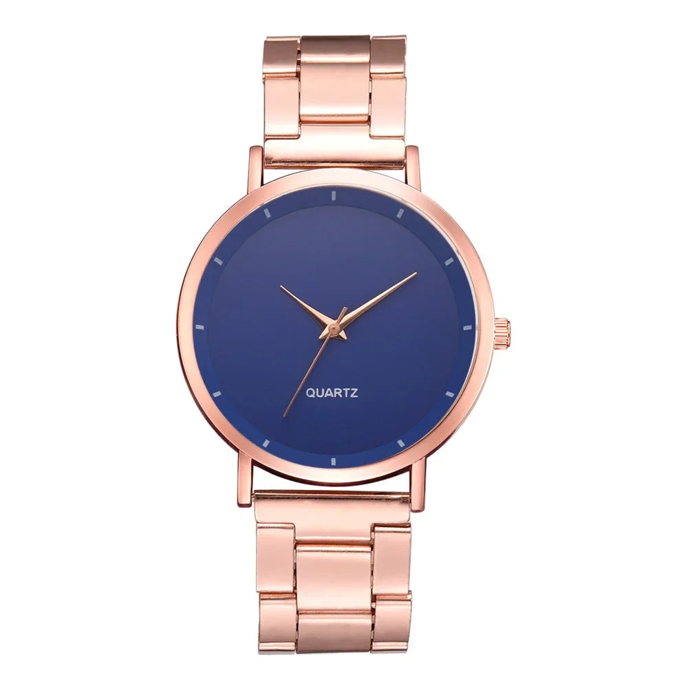 Ladies' rose gold stainless steel watch with a minimalist navy blue dial and link bracelet.