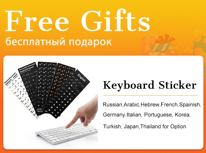 A hand applying a black keyboard sticker overlay to a silver laptop keyboard, with various international language options.