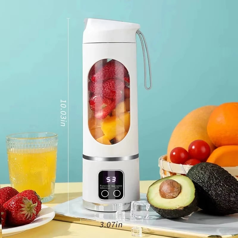 White portable electric blender with a clear fruit-filled center and a digital display screen on the base.