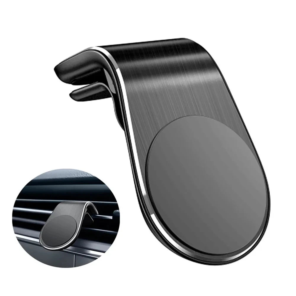 Black magnetic car phone mount with a brushed metal finish, designed to clip onto vehicle air vent slats.