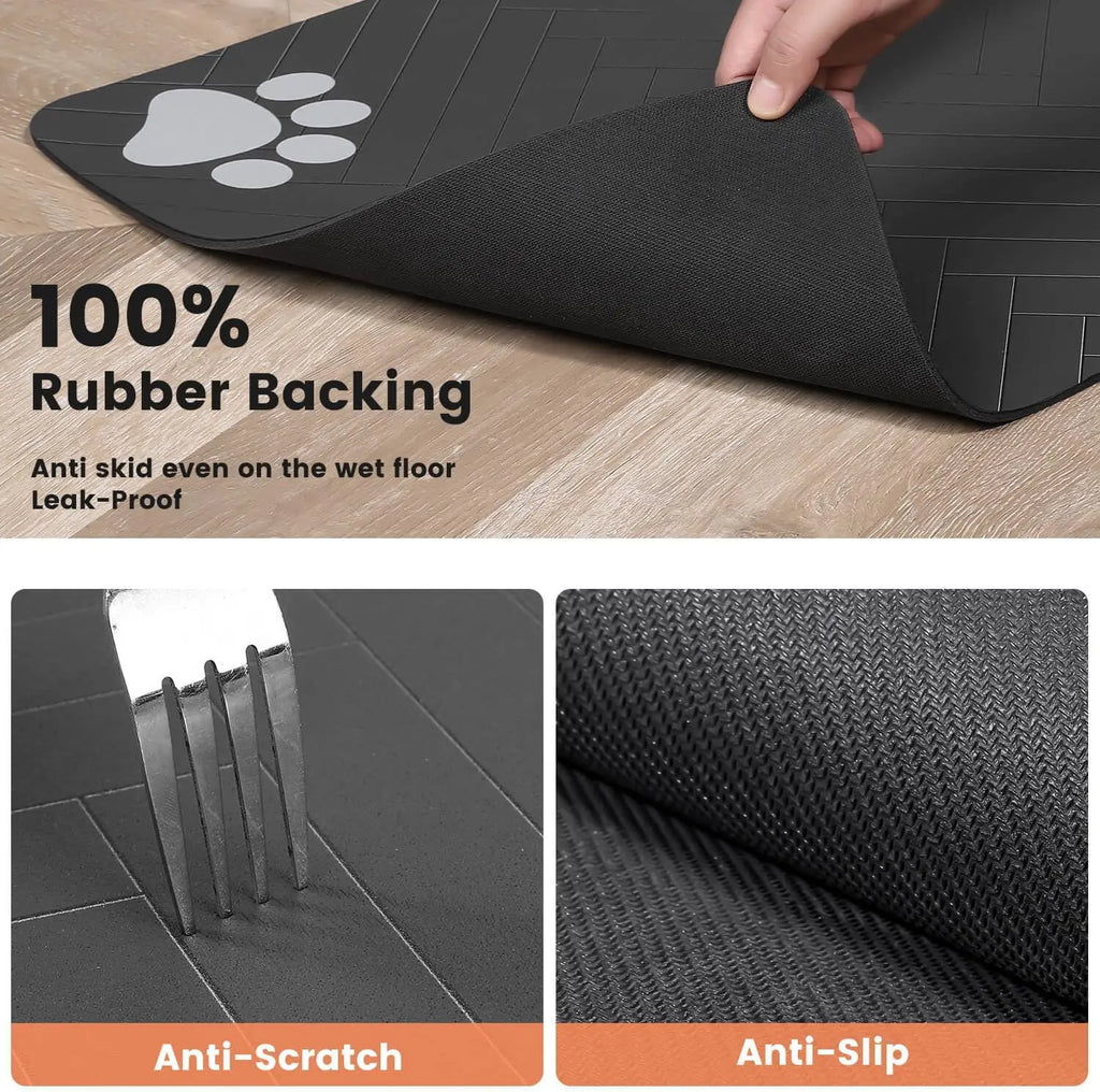 Black non-slip pet feeding mat with a grey paw print design, chevron pattern, and durable rubberized backing.