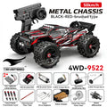 Black and red 4WD RC monster truck with large treaded tires, front LED lights, and black remote control.