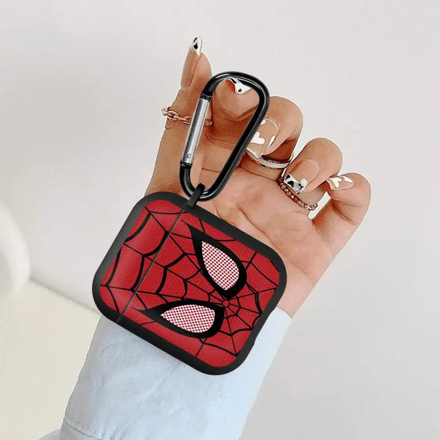 Red and black Spiderman-themed protective case for AirPods with a black carabiner clip, held in a hand.