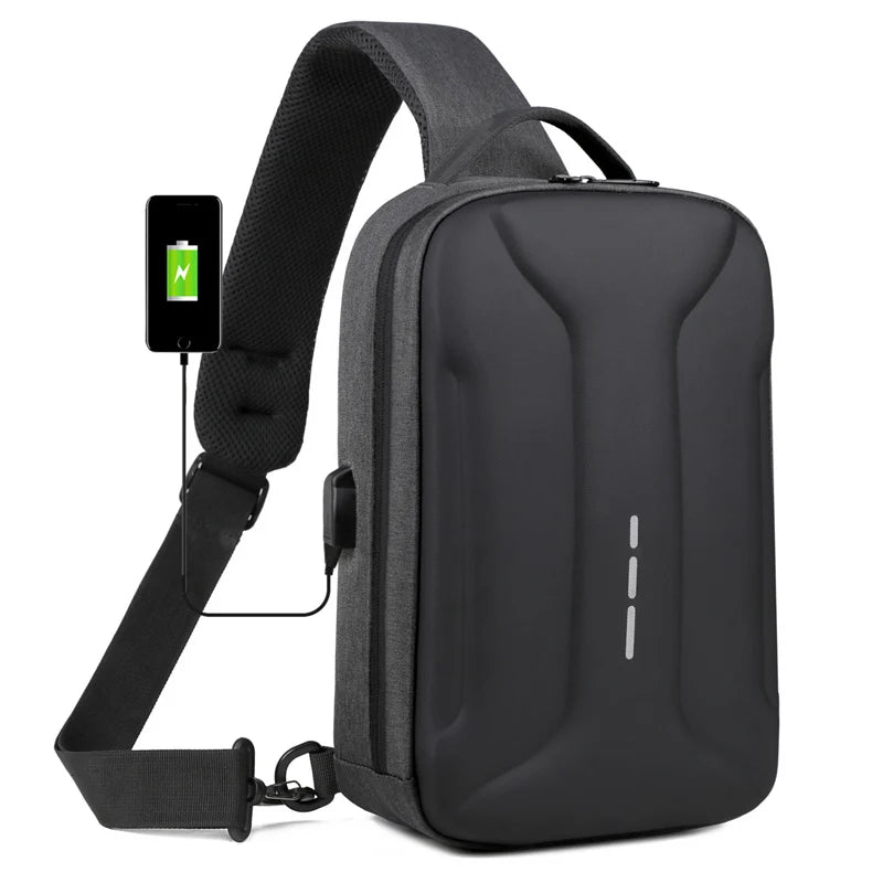Black anti-theft crossbody bag with a hard shell, adjustable padded strap, and integrated USB charging port.