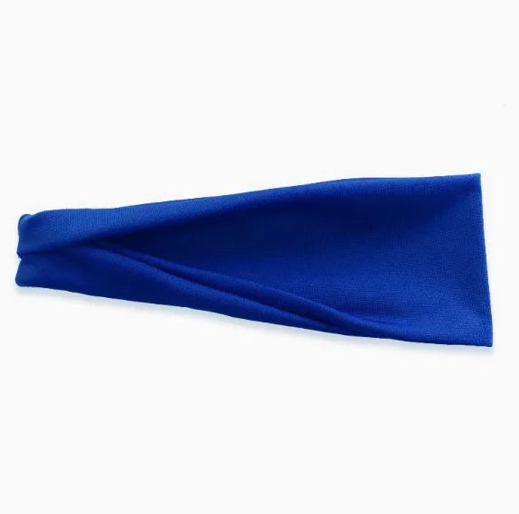 A plain, vibrant royal blue fabric headband with a wide, slightly folded design.