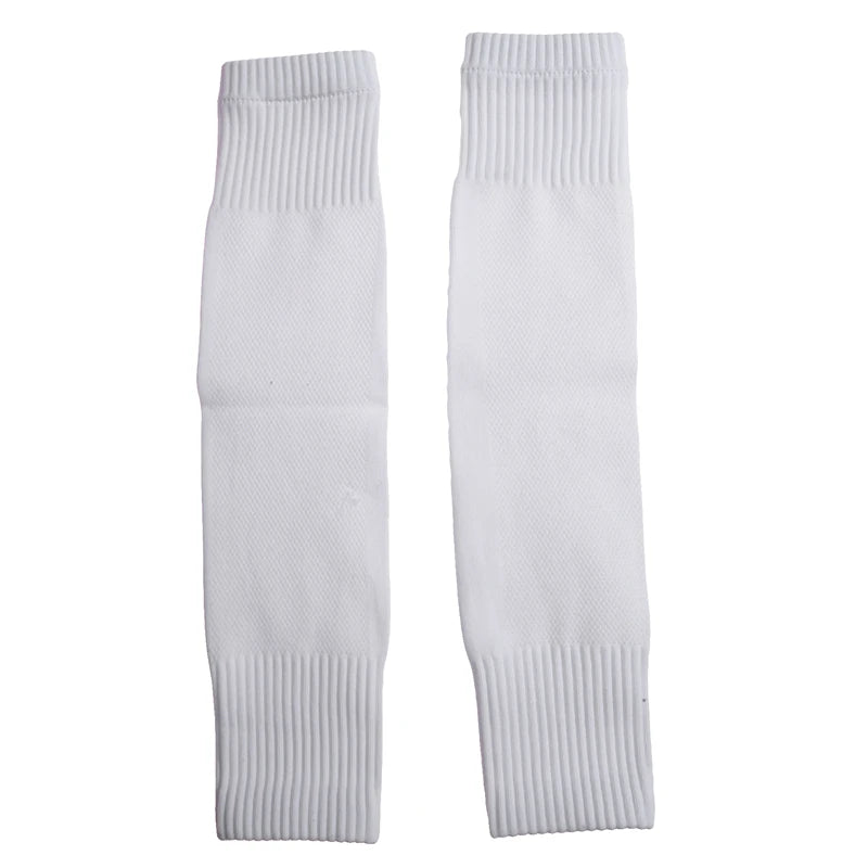 Pair of white, textured sports leg sleeves with ribbed elasticated cuffs at the top and bottom.