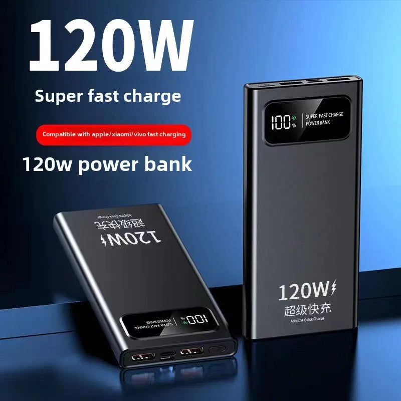 Two slim, metallic grey 120W power banks with digital LED battery percentage displays on a blue background.