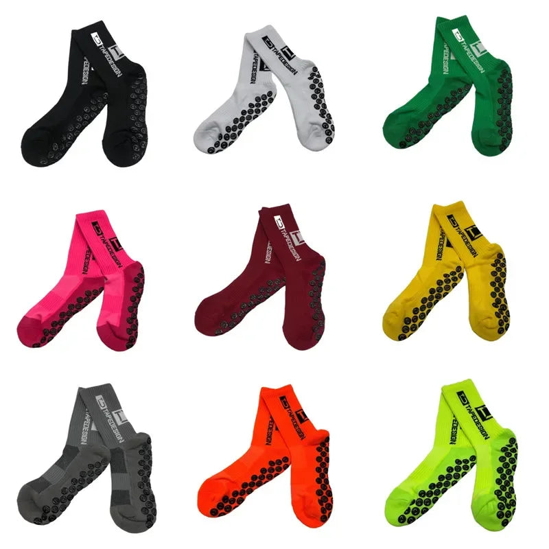 Nine pairs of sports grip socks in various colours, featuring rubberised sole patterns for enhanced stability and traction.