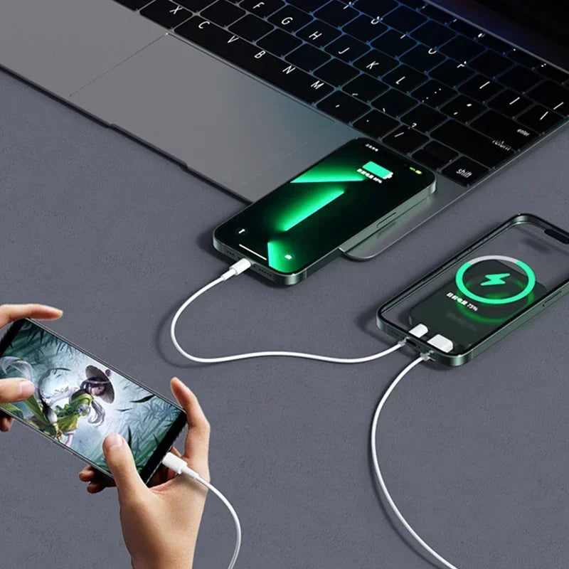 Slim grey magnetic power bank with digital display, charging multiple devices simultaneously via cables.