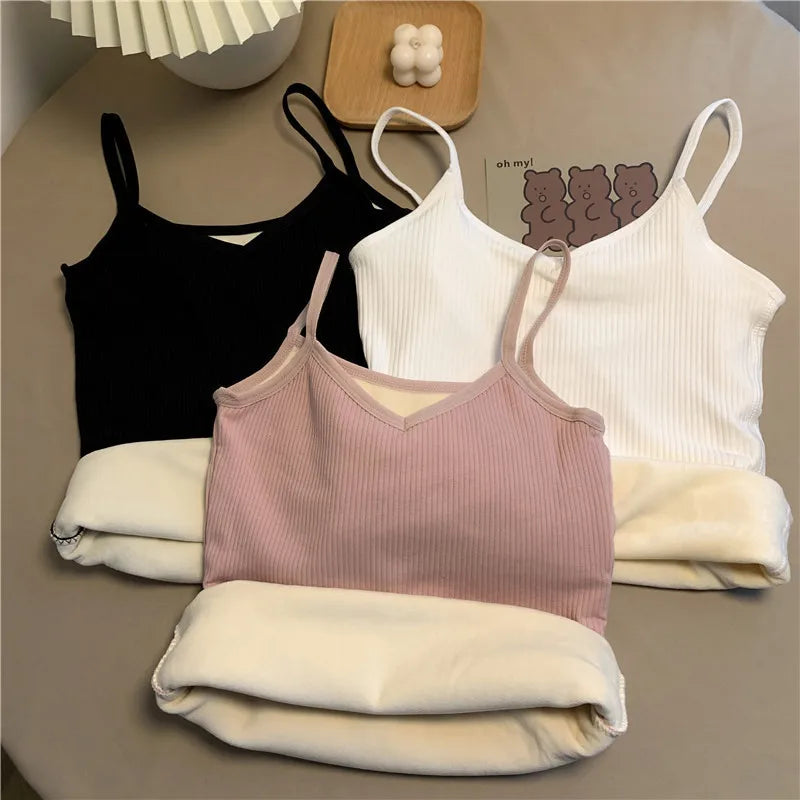 Set of three ribbed camisole tops in black, white, and dusty pink, featuring V-necks and soft thermal fleece lining.