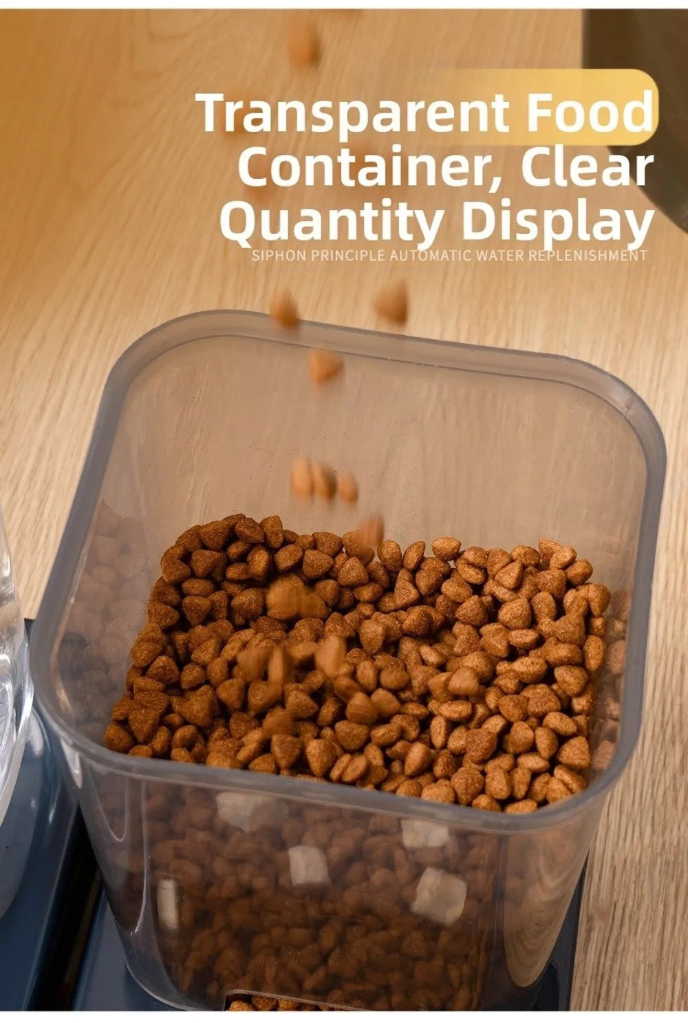 A transparent square pet food container being filled with brown kibble on a wooden surface.