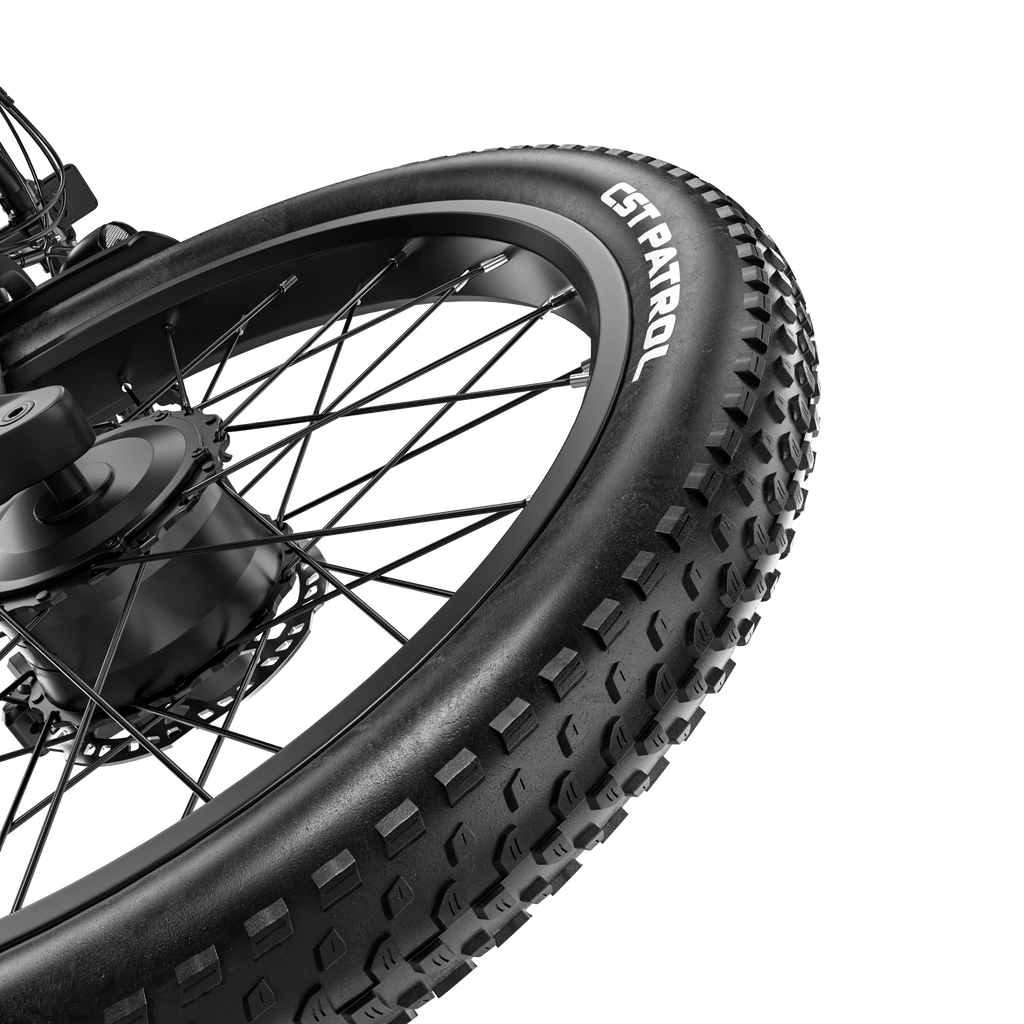 Black 26-inch fat tire of Shengmilo electric mountain bike with deep tread and CST Patrol branding.