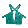 Teal tactical shoulder harness bag with multiple zipped pockets, popper closures and adjustable straps.