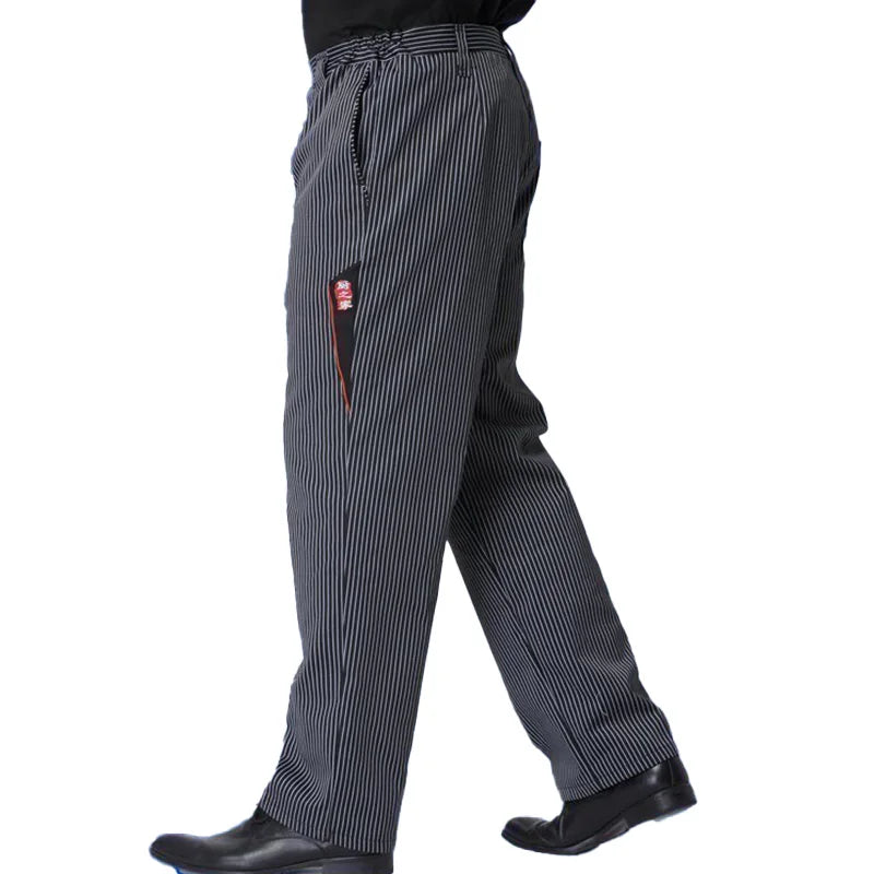 Professional black and grey striped chef trousers with an elasticated waistband and side cargo pocket.