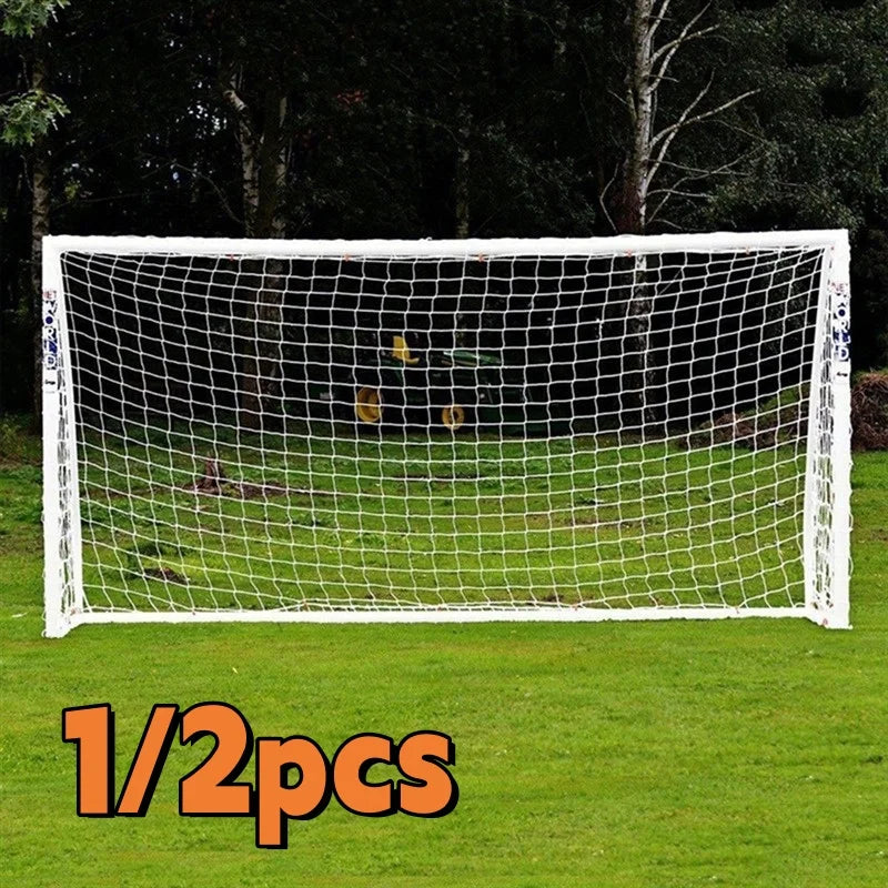 White football goal post with a durable mesh net, set up on a green grass field. Available as a single or pair.