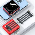 Compact red 20000mAh power bank with digital display, carry strap, and four integrated, detachable charging cables.