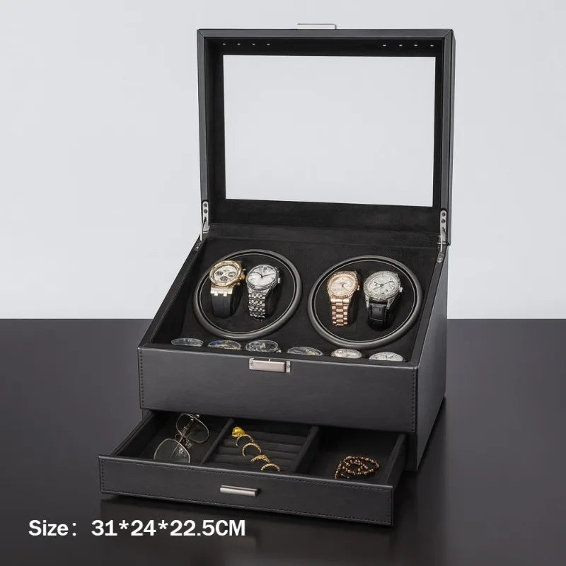 Black leather watch winder box with glass lid, four automatic winders holding watches, and open storage drawer.