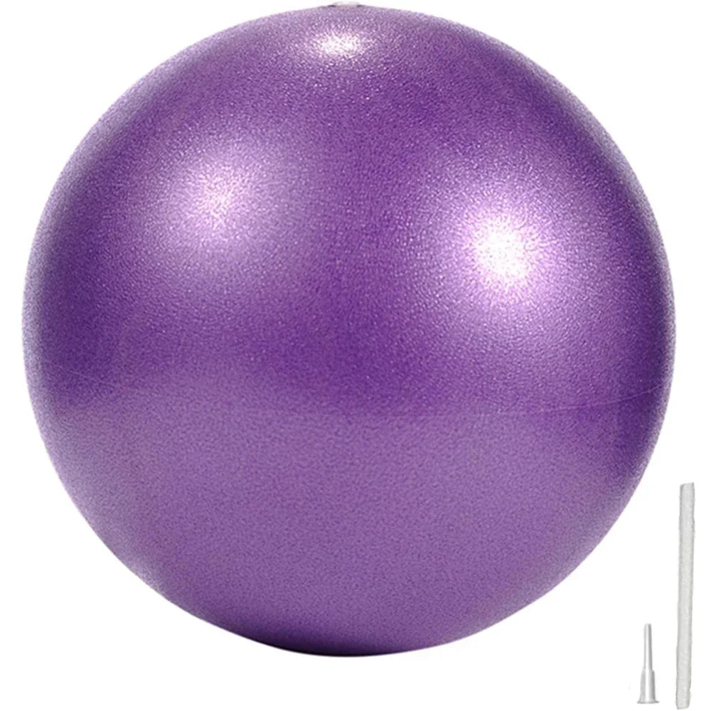 A textured purple fitness ball with an inflation straw and nozzle set on a plain white background.