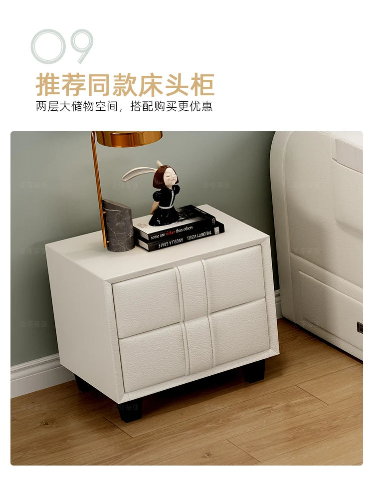 Modern cream, two-drawer upholstered bedside table with a sleek, textured finish next to a matching storage bed.