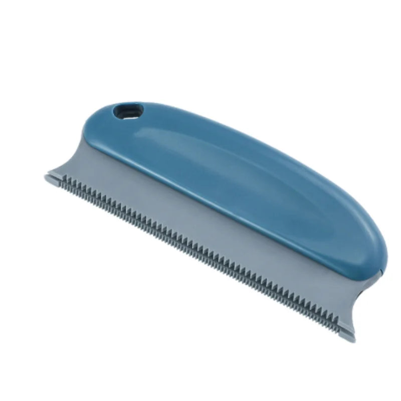 Blue and grey pet grooming shedding tool with a serrated metal edge and a hanging hole in the handle.