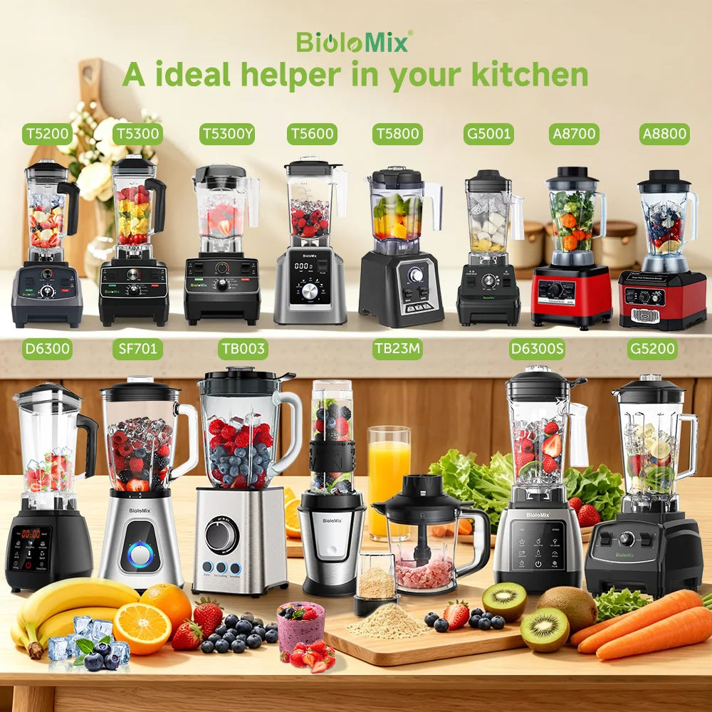 A display of various modern electric countertop blenders and food processors in black, silver, and red finishes.