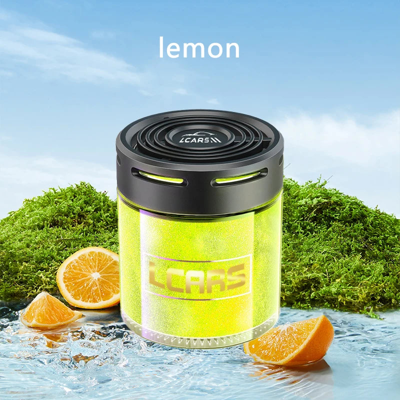 Cylindrical lemon-scented car air freshener with a black lid and vibrant yellow, shimmering gel refill.