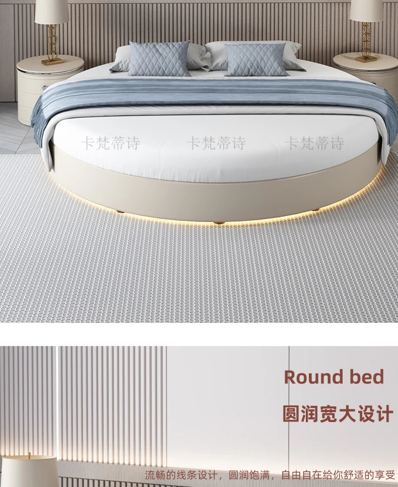 Modern beige circular double bed frame with built-in base LED lighting, shown in a contemporary minimalist bedroom.