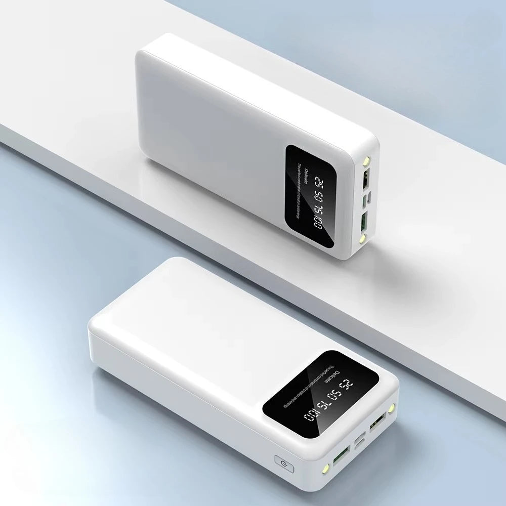Two white portable power banks featuring a digital LED display, USB ports, and a sleek, minimalist design.