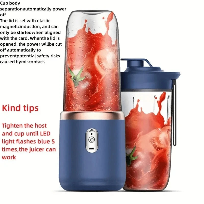 Portable blue personal blender with clear cups containing red smoothie and a central rose gold power button.